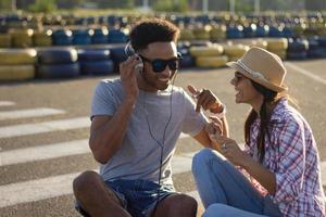 happy young couple listen to music photo