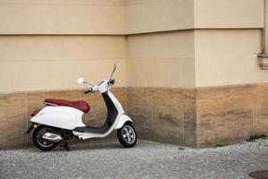 Vintage scooter on the old europe streets photo