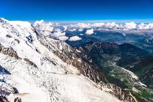 Valley with villages between snowy mountains Chamonix, Mont Blanc, Haute-Savoie, Alps, France photo