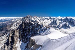 Snowy mountains Chamonix, Mont Blanc, Haute-Savoie, Alps, France photo