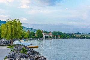 Sunset with reflections on beautiful Geneva lake, Switzerland. photo