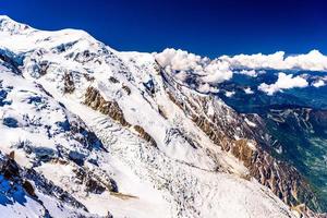 Snowy mountains Chamonix, Mont Blanc, Haute-Savoie, Alps, France photo