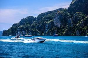 Motor boats and cliff rocks, Phi Phi Don island, Andaman sea, Kr photo