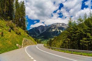 Road among Alps mountains, Klosters-Serneus, Davos,  Graubuenden photo