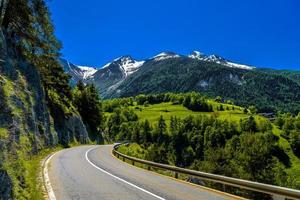 Asphalt road in Alps mountains, Moerel, Filet, Oestlich Raron, Wallis Valais Switzerland photo