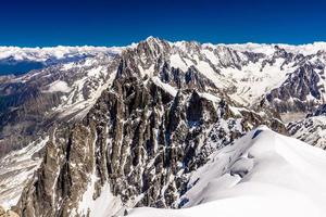 Snowy mountains Chamonix, Mont Blanc, Haute-Savoie, Alps, France photo