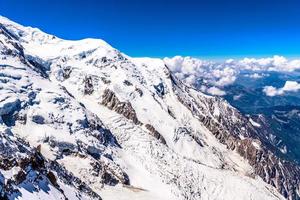Snowy mountains Chamonix, Mont Blanc, Haute-Savoie, Alps, France photo