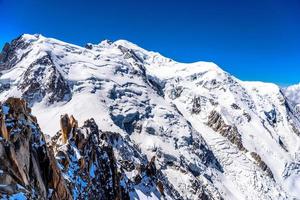 Snowy mountains Chamonix, Mont Blanc, Haute-Savoie, Alps, France photo