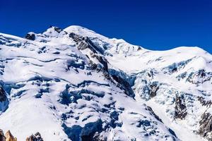 Snowy mountains Chamonix, Mont Blanc, Haute-Savoie, Alps, France photo