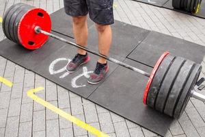 weight lifting equipment, outdoors powerlifting competition, closeups with athletic equipment photo