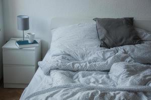 close up of pillows on comfortable bed photo