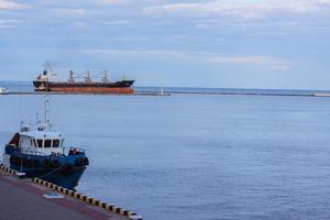 tow ship in the sea port photo