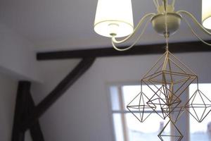 Modern chandelier, interior light close up photo