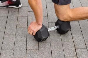 weight lifting equipment, outdoors powerlifting competition, closeups with athletic equipment photo
