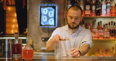 Male Bartender work in the pub photo