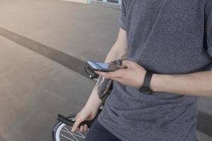 Cyclist man riding fixed gear sport retro bike. photo