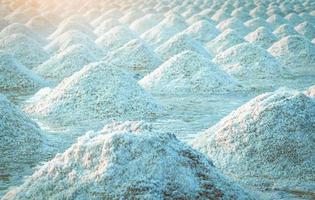 Sea salt farm in Thailand. Organic sea salt. Evaporation and crystallization of sea water. Raw material of salt industrial. Sodium Chloride. Solar evaporation system. Iodine source. Closeup salt pile