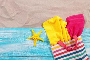 Sand copy space. Sand background top view. Sand copy space. Sand background top view. Beach towels and starfish photo