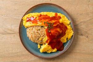 Flavored Fried Rice in an Omelet Wrapping photo