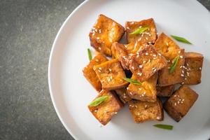 fried tofu with white sesame and teriyaki sauce photo