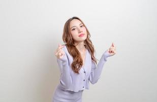 portrait beautiful woman with mini heart hand sign photo