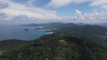 Aerial view of sand beach and water surface texture. Foamy waves with sky. Beautiful tropical beach. Amazing sandy coastline with white sea waves. Nature, seascape and summer concept. video