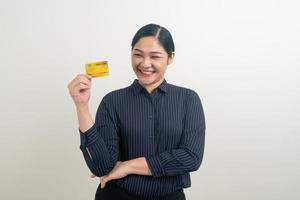 Asian woman holding credit card with white background photo