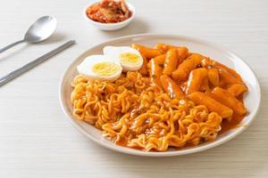 Rabokki or Ramen or Korean instant noodle and Tteokbokki in spicy korean sauce photo