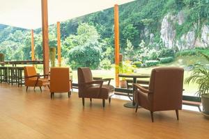 empty sofa chair with table on balcony photo