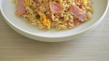 homemade bacon ham fried rice on white plate video