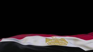 Egypt fabric flag waving on the wind loop. Egyptian embroidery stiched cloth banner swaying on the breeze. Half-filled black background. Place for text. 20 seconds loop. 4k