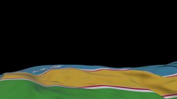 bandeira de tecido caracalpaquistão acenando no loop de vento. karakalpakstan bordado bandeira de pano costurado balançando na brisa. fundo preto meio preenchido. lugar para texto. Ciclo de 20 segundos. 4k video