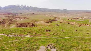 Scenic aerial panorama of archeological site in Kars, Turkey - Armenian medieval city ruins of Ani in spring. Part of Silk way route video