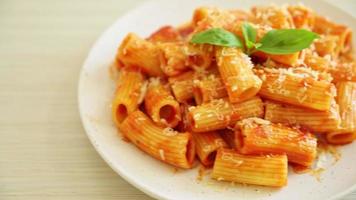 Rigatoni pasta with tomato sauce and cheese - traditional Italian pasta video