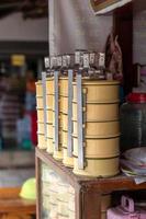 Old antique tiffin container, yellow.