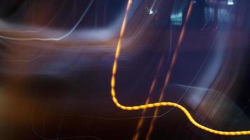 Light trails from panning on the streets at night. photo