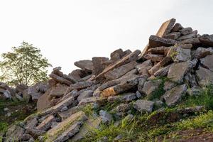 View of concrete debris piles with sunlight. photo