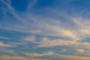 Cloudy sky background with the sun rise early in the morning. photo