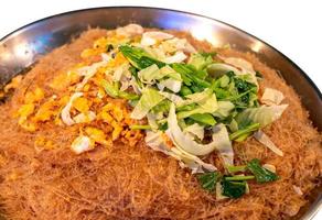 Fried noodles with many vermicelli and vegetables. photo