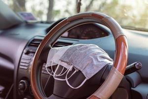 Hygienic masks in the steering wheel. photo