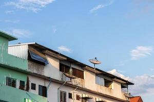 Abandoned buildings with daytime sky clouds. photo