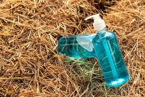 Blue alcohol gel placed on a pile of straw. photo