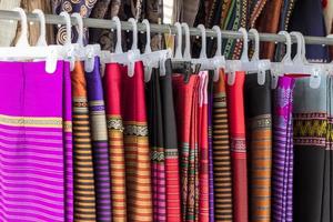 Rows of hanging colorful sarong. photo