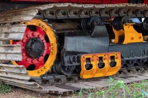 Steel wheels, tracked vehicles, combine harvester. photo