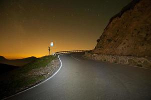 Road in the starry night photo