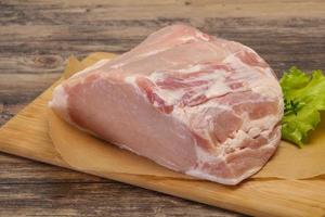 Raw pork meat piece for cooking photo
