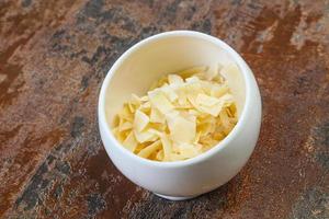 Coconut dry chips in the bowl photo