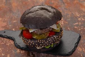 Tasty black burger photo