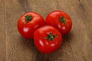 Ripe juicy tomatoes photo