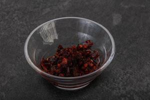 Fried chili pepper sauce with oil photo